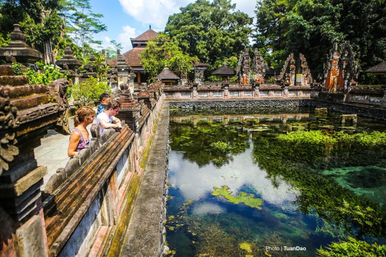 Holy bath in sacred Empul Pura Tirta temple in Bali