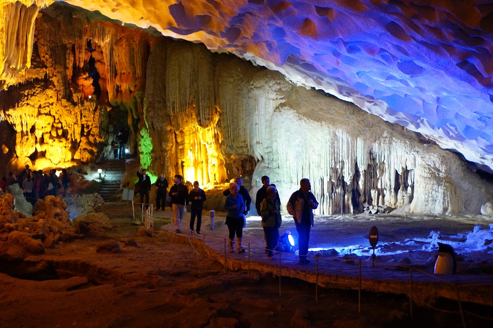 Visiting stunning caves in Halong Bay